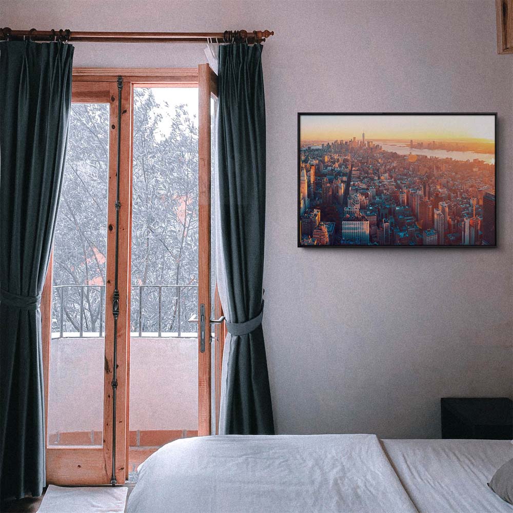 Skyline Manhatten von oben im schwarzen Bilderrahmen, 50x50cm