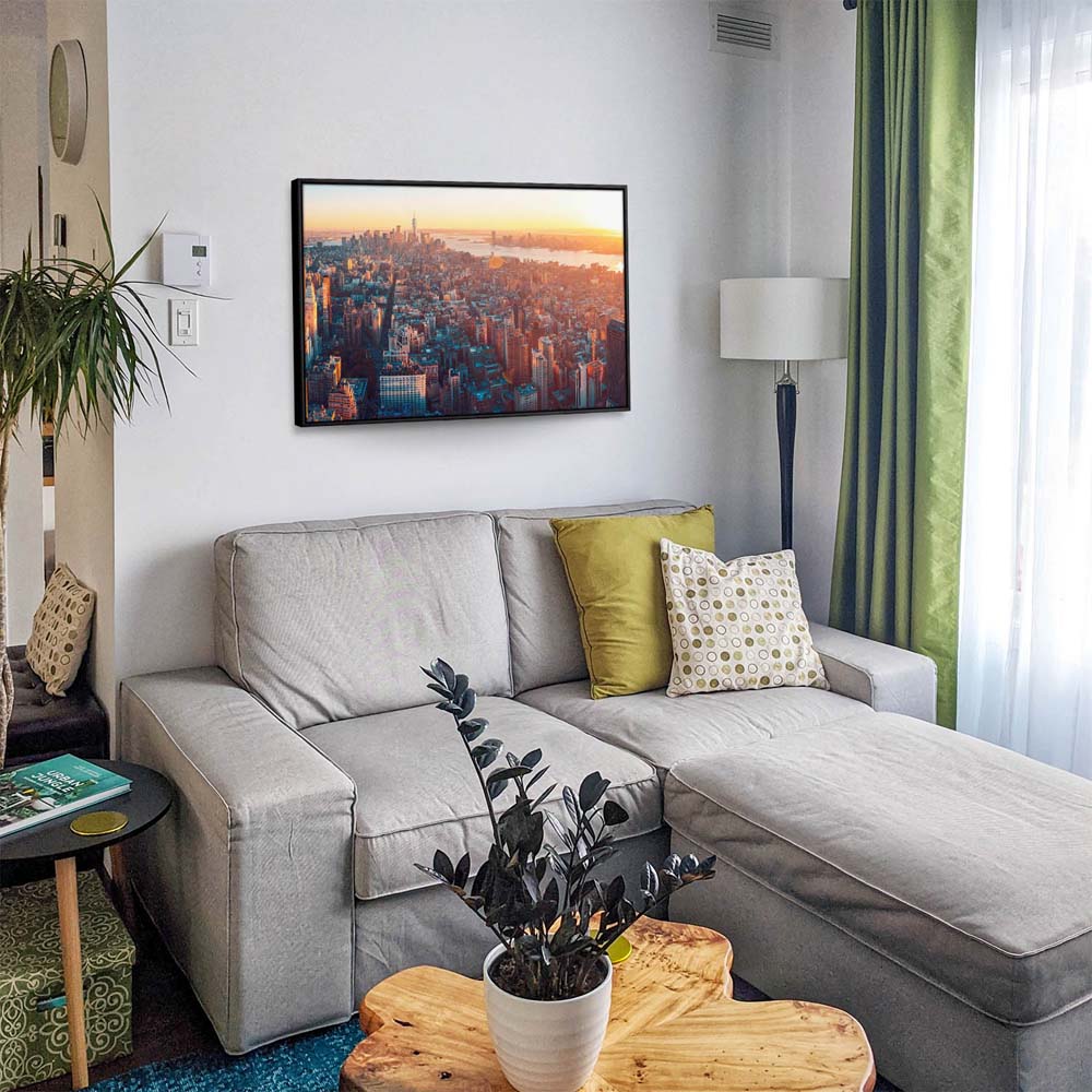 Skyline Manhatten von oben im schwarzen Bilderrahmen, 50x50cm